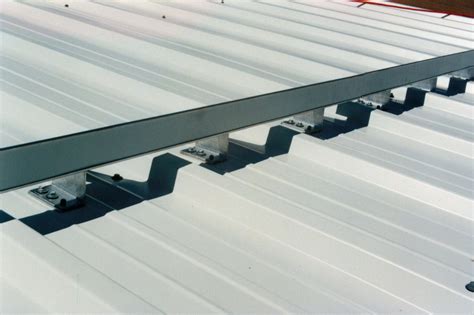 metal roof mounting bracket|standing seam metal roofing brackets.